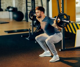Young male dip of knees sport Stock Photo 01