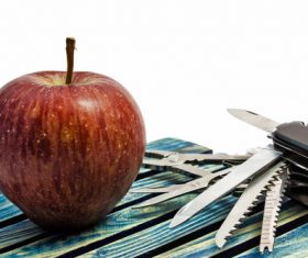 Apple and multi-tool Stock Photo