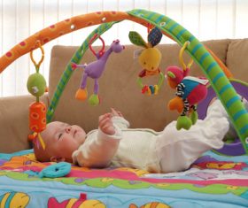 Baby and toys Stock Photo