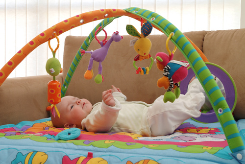 Baby and toys Stock Photo