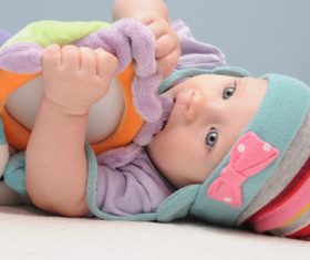 Baby biting a toy Stock Photo 03