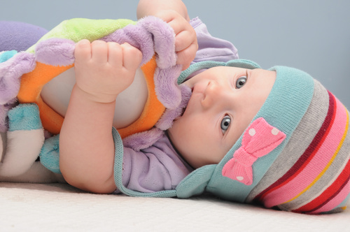 Baby biting a toy Stock Photo 03