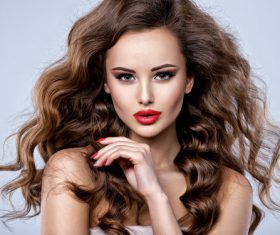 Beautiful woman with long brown curly hair Stock Photo 02