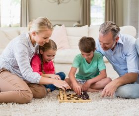 Family playing Chess Stock Photo