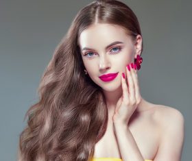 Fashionable bright makeup girl wearing flower earrings Stock Photo 01