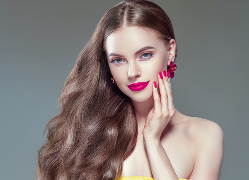 Fashionable bright makeup girl wearing flower earrings Stock Photo 01