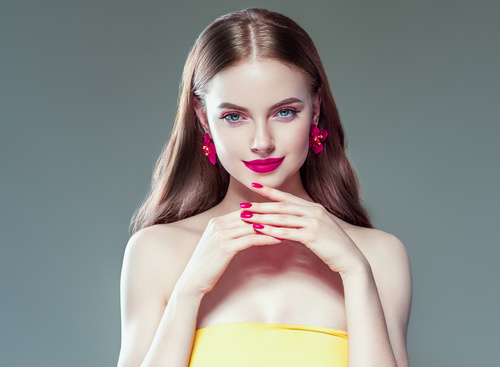 Fashionable bright makeup girl wearing flower earrings Stock Photo 10