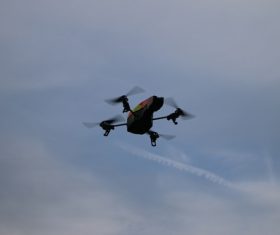 Four-axis remote drone in the air Stock Photo 01