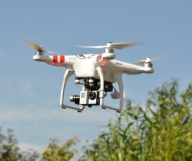 Four-axis remote drone in the air Stock Photo 02