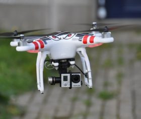 Four-axis remote drone in the air Stock Photo 03