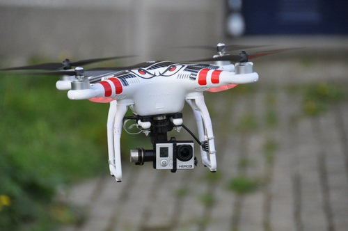 Four-axis remote drone in the air Stock Photo 03