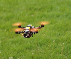 Four-axis remote drone in the air Stock Photo 04