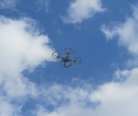 Four-axis remote drone in the air Stock Photo 09