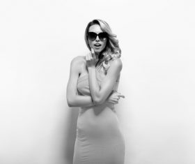 Posing woman wearing sunglasses in studio shooting Stock Photo 01