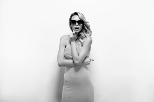 Posing woman wearing sunglasses in studio shooting Stock Photo 01
