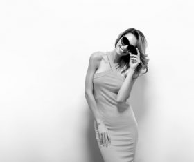 Posing woman wearing sunglasses in studio shooting Stock Photo 03