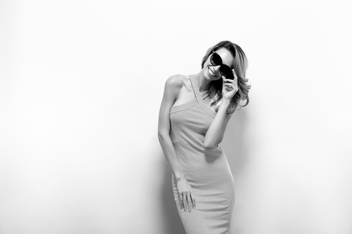 Posing woman wearing sunglasses in studio shooting Stock Photo 03