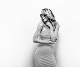 Posing woman wearing sunglasses in studio shooting Stock Photo 04