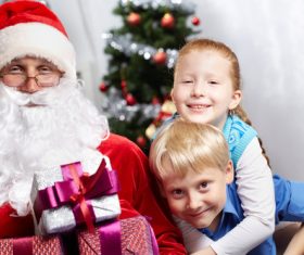 Santa Claus and cute children Stock Photo 02