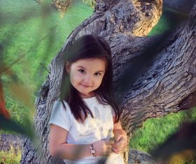 Smiling cute little girl Stock Photo