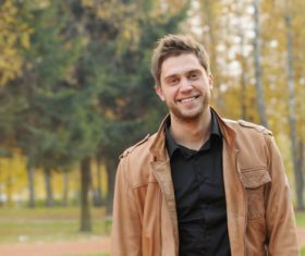Smiling man outdoors Stock Photo