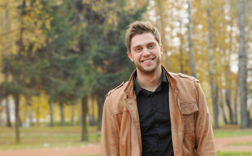Smiling man outdoors Stock Photo
