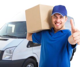 Smiling young delivery guy Stock Photo 01
