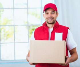Smiling young delivery guy Stock Photo 04