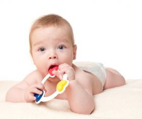 Stock Photo Baby holding rattle to play 04