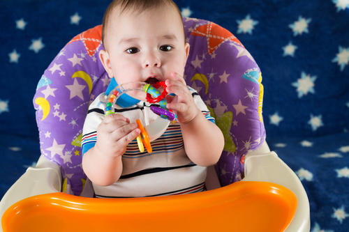 Stock Photo Baby holding rattle to play 07