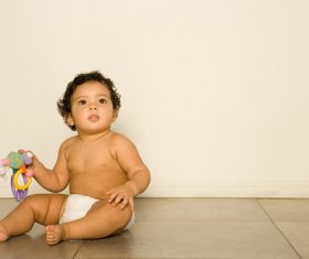 Stock Photo Baby holding rattle to play 12