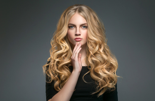 Stock Photo Beautiful girl with blond curly long hair 02