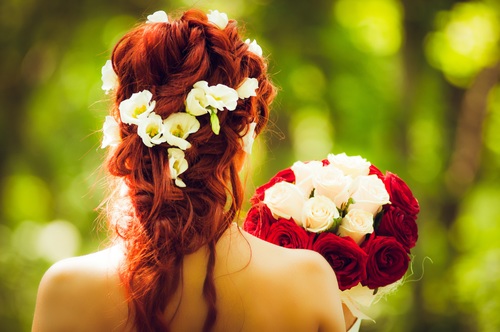 Stock Photo Bride hairstyle decorated with flowers