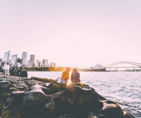 Stock Photo Crowd watching the sea by the beach