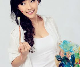 Stock Photo Cute female painter