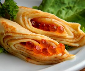 Stock Photo Delicious pancake with red caviar 03