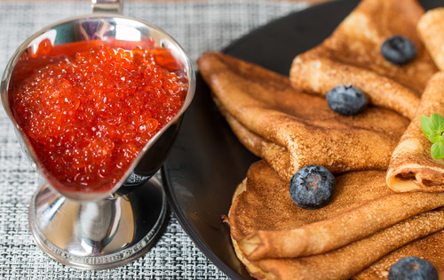 Stock Photo Delicious pancake with red caviar 09