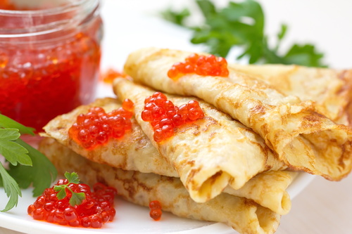 Stock Photo Delicious pancake with red caviar 11