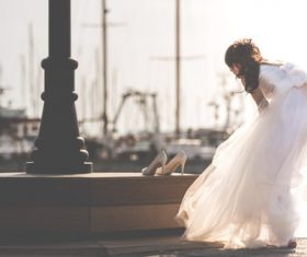 Stock Photo Girl preparing to take wedding photo