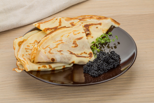 Stock Photo Pancake with black caviar 01