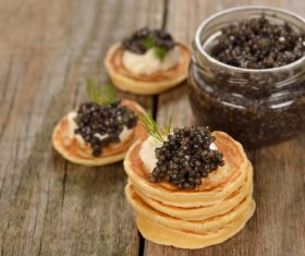 Stock Photo Pancake with black caviar 03