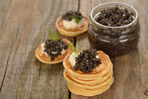 Stock Photo Pancake with black caviar 03