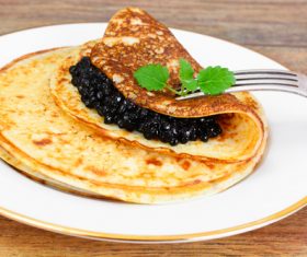 Stock Photo Pancake with black caviar 04