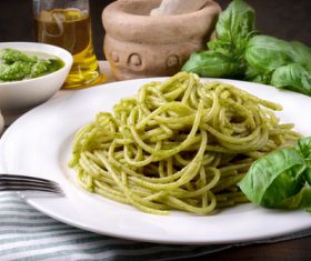 Stock Photo Pine nuts green sauce pasta