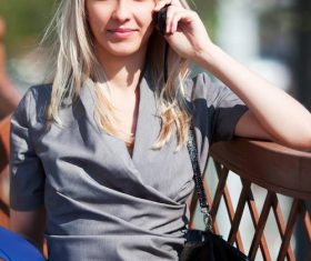 Stock Photo Pretty woman phoning