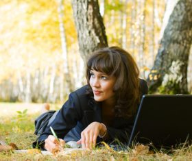 Stock Photo Woman studying in the park 01