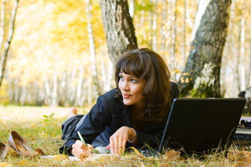 Stock Photo Woman studying in the park 01