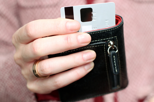 Woman holding wallet Stock Photo 03