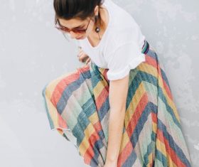 Woman tidying up shoes Stock Photo