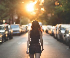 Woman walking in city Stock Photo